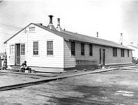 An old black and white photo of a circa 1933 barracks at Camp Edwards